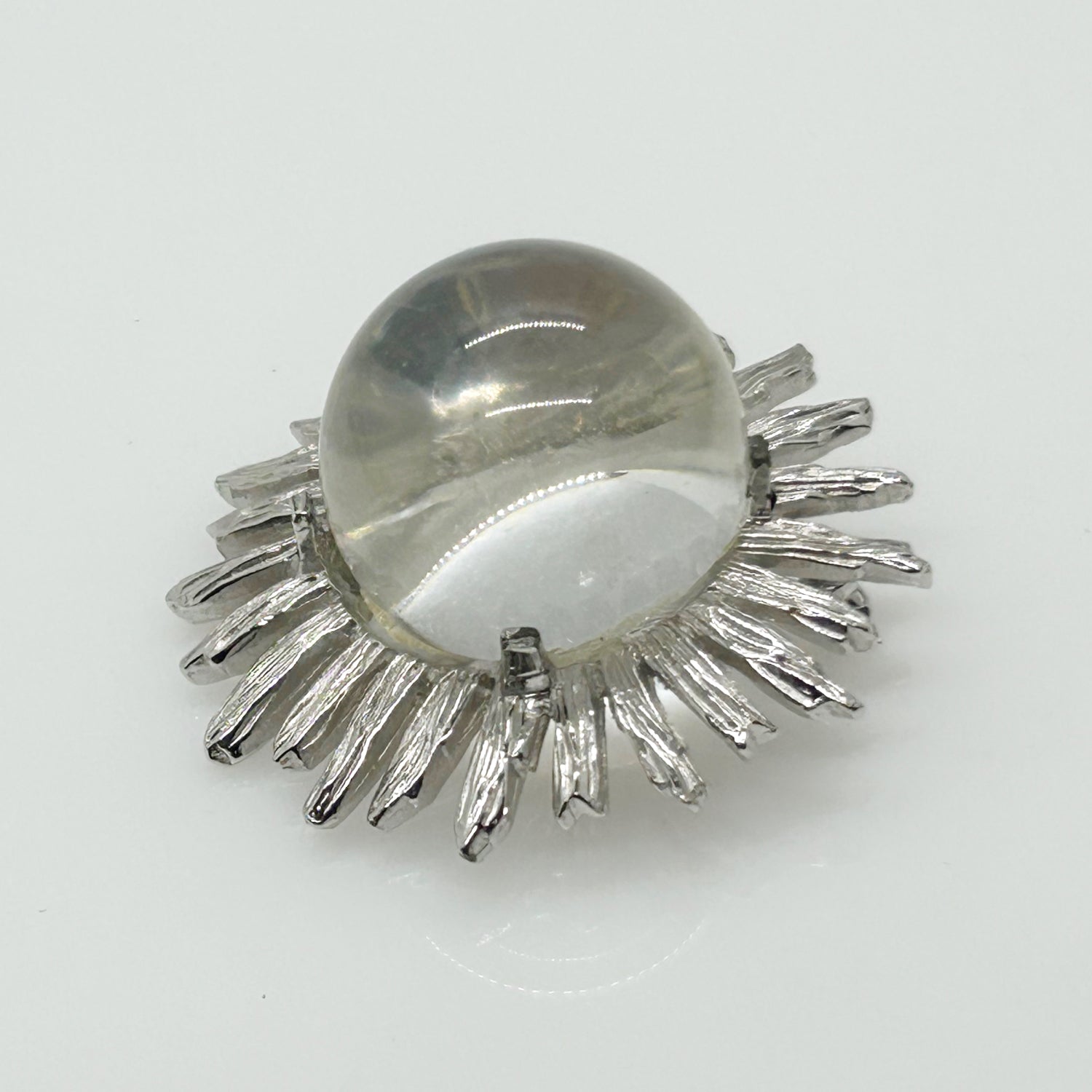 Perfect for vintage jewelry lovers: our Vintage Clear Bubble Brooch with Silvetone Frame provides a unique clear glass sphere design. Shop today!