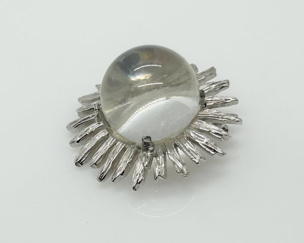 Perfect for vintage jewelry lovers: our Vintage Clear Bubble Brooch with Silvetone Frame provides a unique clear glass sphere design. Shop today!
