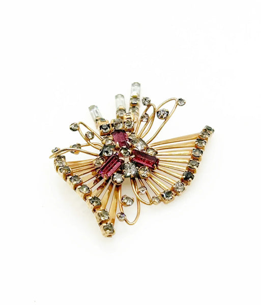 Introducing the M&amp;S 1/20 12kt G.F. Abstract Butterfly Brooch/Pendant — the perfect vintage solution to your style dilemmas. This exquisite butterfly brooch pendant highlights delicate abstract artistry paired with shimmering grey and purple/pink rhinestones