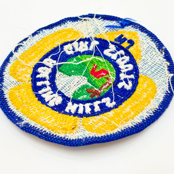 Girl Scouts patch with 'Rolling Hills Girl Scouts' text on a white background