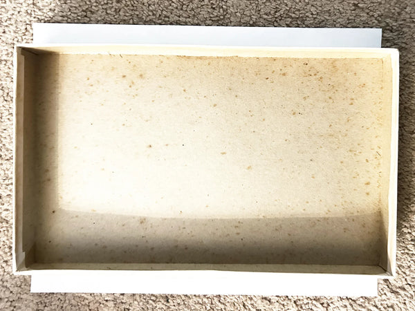 This is a vintage boxed set of "Animated Alice in Wonderland Dolls" paper dolls manufactured by the Milton Bradley Company. The set, number 4109, was designed by Emma C. McKean and includes seven scene cards where the dolls can be inserted into die-cut slits to "animate" the scenes.