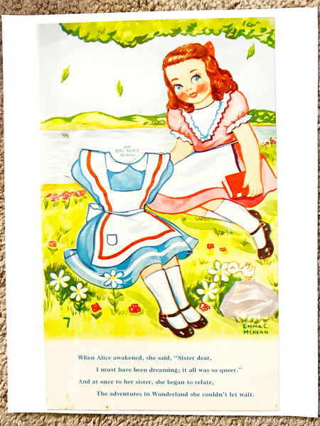 This is a vintage boxed set of "Animated Alice in Wonderland Dolls" paper dolls manufactured by the Milton Bradley Company. The set, number 4109, was designed by Emma C. McKean and includes seven scene cards where the dolls can be inserted into die-cut slits to "animate" the scenes.