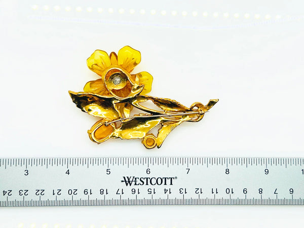 Statement 4" Vintage Butterscotch Floral Brooch provides bold elegance with amber colored petals and sparkling rhinestone center. Shop today!