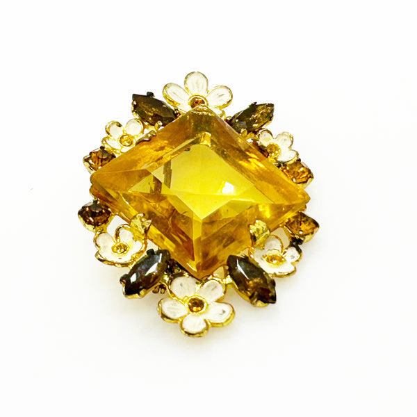 Perfect for vintage jewelry lovers: our Antique Clear Yellow Stone Floral Czech Brooch provides timeless elegance with enameled flowers and a clear center stone. Shop today!