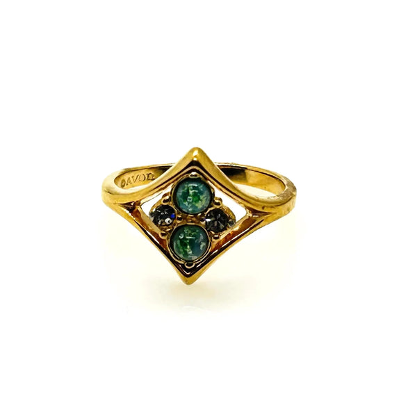 Here's a captivating description for our vintage Avon ring: Discover the charm of this exquisite Avon ring, a delightful piece from 1984, originating from the iconic "Glowing Sparkles" collection. 