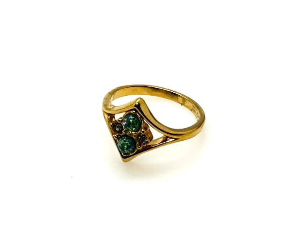 Here's a captivating description for our vintage Avon ring: Discover the charm of this exquisite Avon ring, a delightful piece from 1984, originating from the iconic "Glowing Sparkles" collection. 
