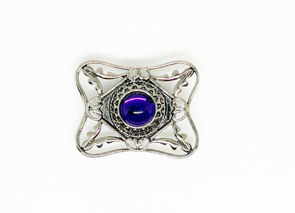 Perfect for vintage Avon enthusiasts: our Bold and Classic Medieval Style Pin with Purple Stone provides timeless elegance and bold sophistication. Shop today!