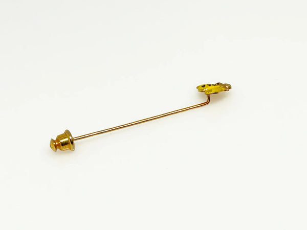 This charming vintage stick pin features a delightful black and gold bee design. The pin measures 1.75” in length, making it a perfect accessory to add a touch of whimsy to any outfit.