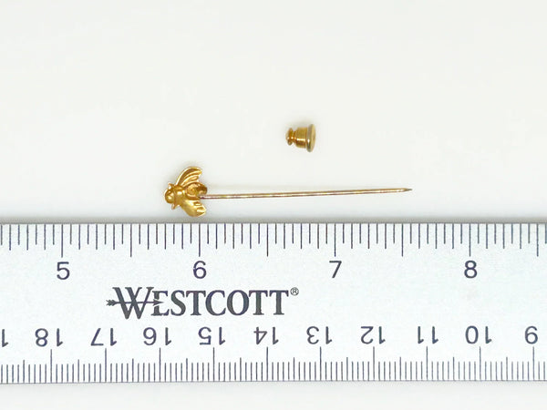 This charming vintage stick pin features a delightful black and gold bee design. The pin measures 1.75” in length, making it a perfect accessory to add a touch of whimsy to any outfit.