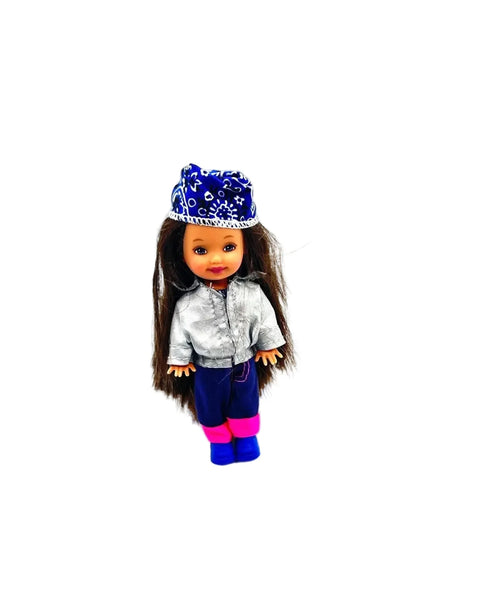 Introducing Belinda, a cherished friend of Kelly, Barbie's beloved younger sister, who takes center stage in this delightful doll. 