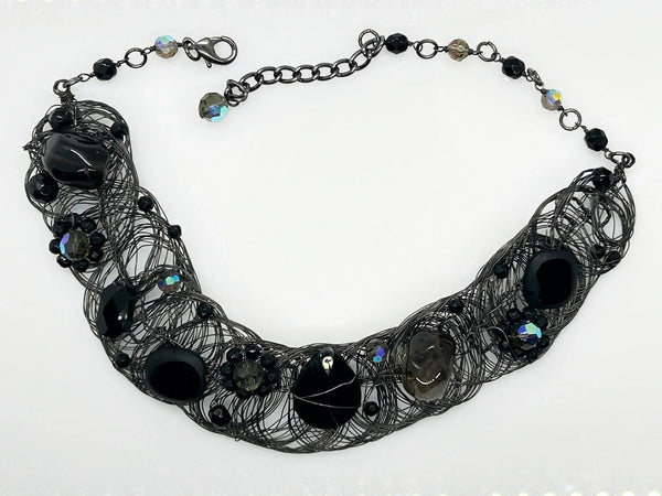 Black woven wire with stones necklace and adjustable fit for unique edgy style and bold elegance. The artistry and stunning appearance will make it a favorite. 