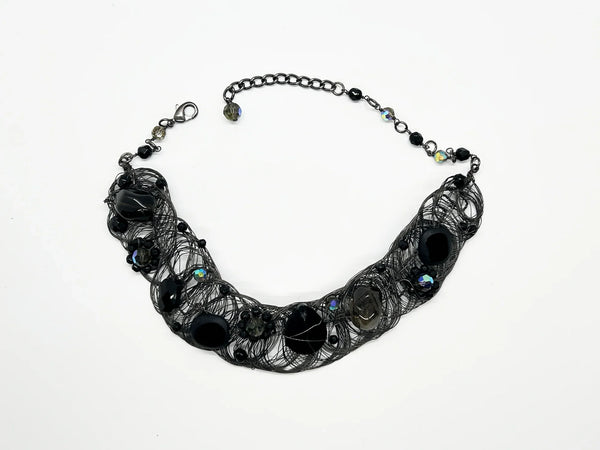 Black woven wire with stones necklace and adjustable fit for unique edgy style and bold elegance. The artistry and stunning appearance will make it a favorite. 