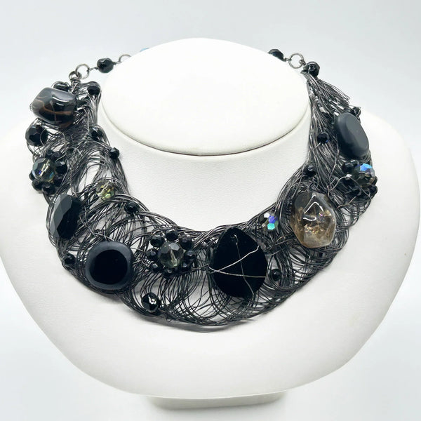 Black woven wire with stones necklace and adjustable fit for unique edgy style and bold elegance. The artistry and stunning appearance will make it a favorite. 