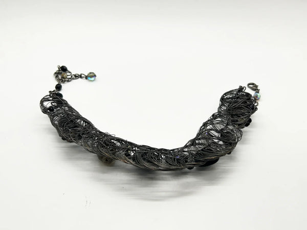Black woven wire with stones necklace and adjustable fit for unique edgy style and bold elegance. The artistry and stunning appearance will make it a favorite. 