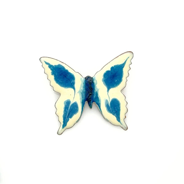 Perfect for collectors and vintage lovers: our Vintage Porcelain Blue and Cream Butterfly Brooch provides a hand-painted, unique enamel design. Shop today!