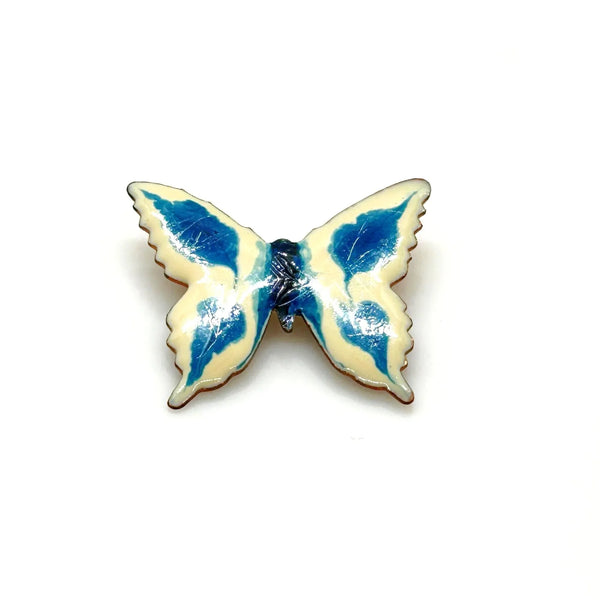 Perfect for collectors and vintage lovers: our Vintage Porcelain Blue and Cream Butterfly Brooch provides a hand-painted, unique enamel design. Shop today!