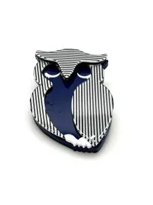 Shop this vintage-style striped owl brooch. A bold blue and white acrylic mod pin perfect for adding retro 70s op art charm to blazers and coats