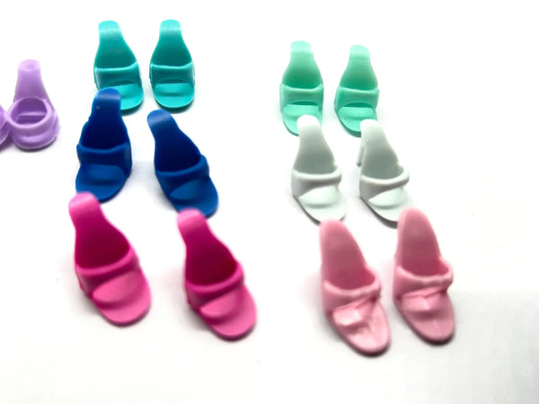 Vintage Barbie doll open toe mule heels shoes replacement lot of 7 matching pairs in multi-color pastel and bright shades for 11.5 inch fashion dolls.
