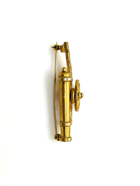 Perfect for vintage jewelry collectors: our vintage cannon brooch provides finely detailed design with a sizable turning wheel. Shop today!