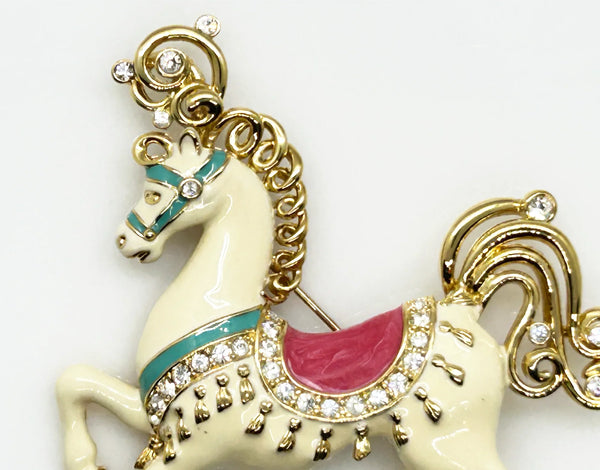 Perfect for vintage style lovers: our Bob Mackie Prancing Carousel Horse Brooch provides a dazzling, unique statement piece. Shop today!