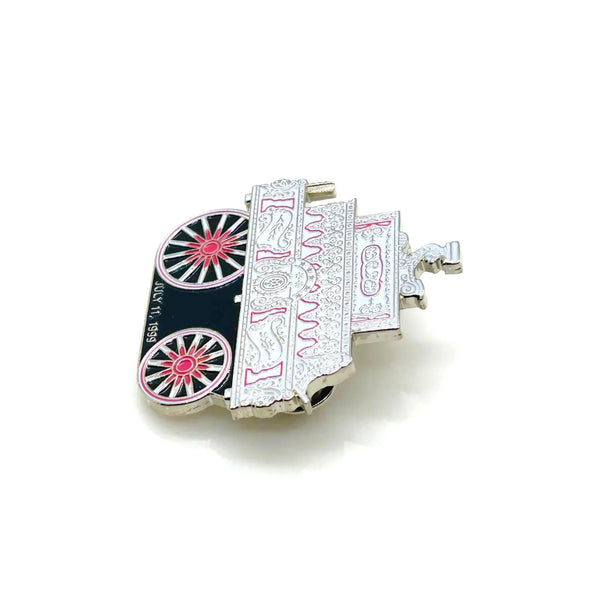 Check out this vintage enamel lapel pin! It's got the C.P. Huntington steam locomotive on it. The silver-toned metal has red, pink, white, and black enamel accents, and shows the date "JULY 11, 1999"
