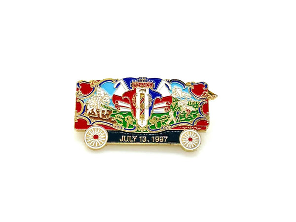 What a delightful piece of circus history! This charming vintage enamel lapel pin celebrates the France Bandwagon from the beloved Circus World Museum in Wisconsin, captured on July 13, 1997.