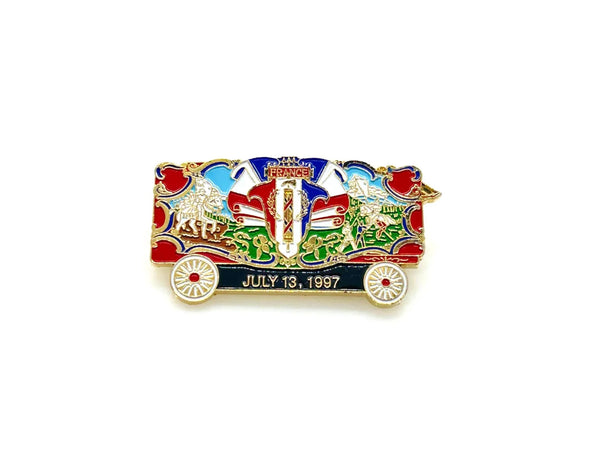 What a delightful piece of circus history! This charming vintage enamel lapel pin celebrates the France Bandwagon from the beloved Circus World Museum in Wisconsin, captured on July 13, 1997.