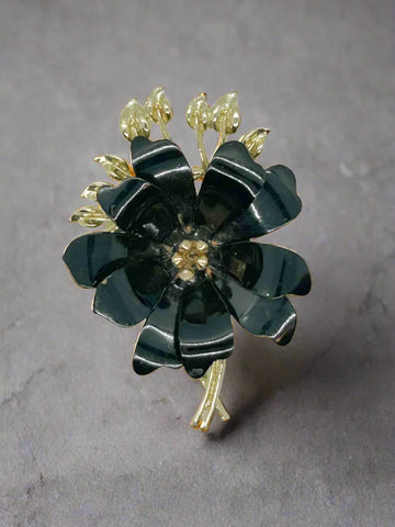 Enchanting Black Enamel and Gold Vintage Flower Brooch by Coro