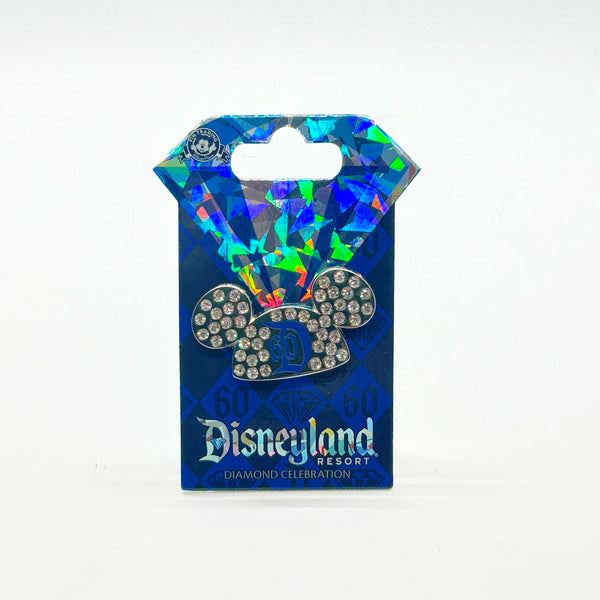 Disneyland Resort diamond celebration pin on a blue card with colorful design