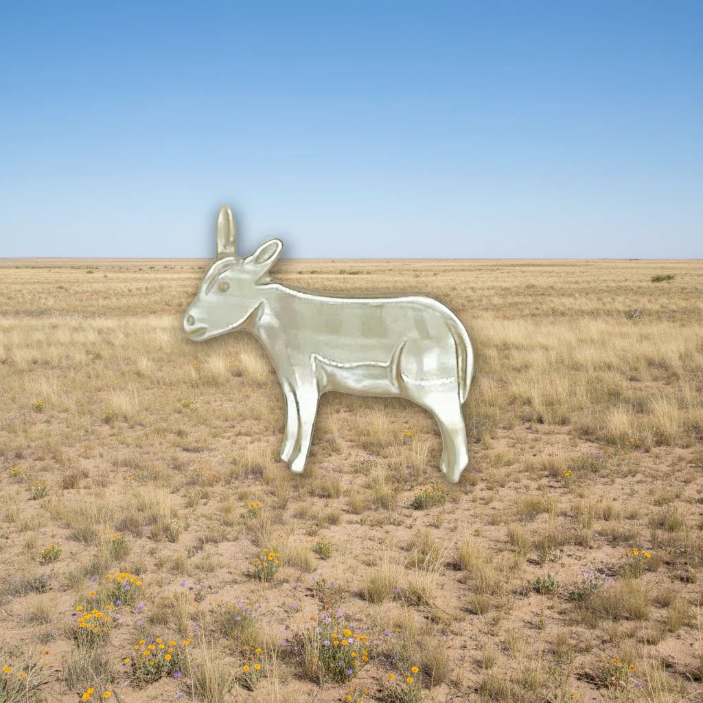 This sweet vintage mother of pearl donkey brooch, measures 1.25” and is in very good condition. The detail is lovely and the design is unusual. Unleash your unique sense of style with this charming vintage mother of pearl donkey brooch! 