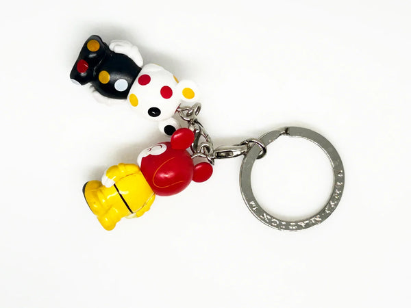 Dopey, from Snow White and the Seven Dwarves;appears as a clown themed Vinylmation Jr.stylized version of himself with a Mickey theme, along with a polka-dotted version.