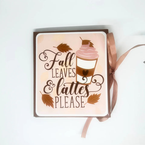 This charming album showcases autumn leaves, seasonal flowers, and delightful illustrations of warm drinks. Centered around family, home, fall, and coffee, it includes dedicated spaces for your personal notes and mementos, allowing you to customize it easily.