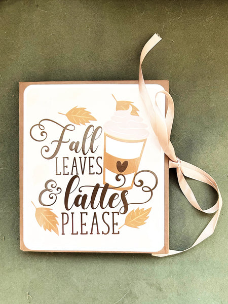 This charming album showcases autumn leaves, seasonal flowers, and delightful illustrations of warm drinks. Centered around family, home, fall, and coffee, it includes dedicated spaces for your personal notes and mementos, allowing you to customize it easily.