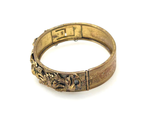 Discover our stunning Floral Bangle. This vintage-inspired, decorative gold bracelet adds an elegant touch to any outfit. Shop Lamoree’s Vintage now!