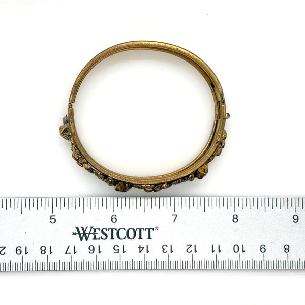 Discover our stunning Floral Bangle. This vintage-inspired, decorative gold bracelet adds an elegant touch to any outfit. Shop Lamoree’s Vintage now!