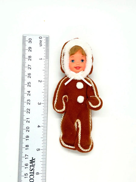Here's the 2001 Mattel "Barbie in The Nutcracker" Kelly's Tommy as Gingerbread Boy. This charming 4.5-inch Tommy doll is exquisitely dressed in a delightful gingerbread boy outfit,