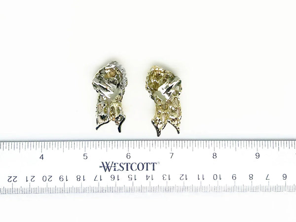 Golden Sparkling Stones Knot Earrings - Make a dazzling statement with radiant aurora borealis stones. Featuring a secure hinge back for comfortable wear. Shop now!