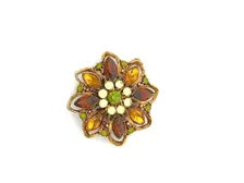1950s Austrian costume jewelry flower pin with multi-colored faceted crystals and olivine rhinestone center