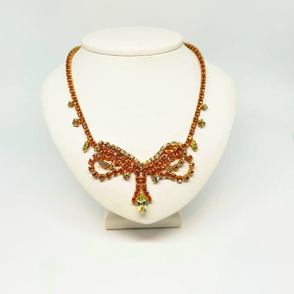 Perfect for discerning collectors: our Vintage Golden Rhinestone Parure provides timeless elegance with bright stones that captivate. Shop today!