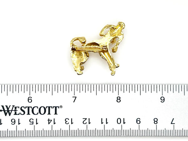 Imagine adding a touch of timeless charm and playful elegance to your everyday outfit with a vintage dog brooch that captures hearts at first glance. This delightful gold poodle brooch brings a sense of whimsy and nostalgia, evoking feelings of warmth and joy every time you wear it.