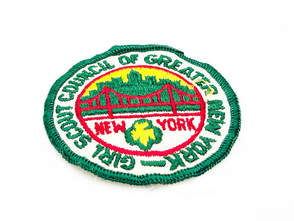 Embroidered patch with 'Girl Scout Council of Greater New York' logo on a white background