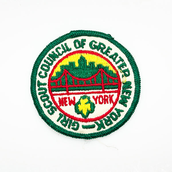 Embroidered patch with 'Girl Scout Council of Greater New York' logo on a white background