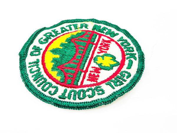 Embroidered patch with 'Girl Scout Council of Greater New York' logo on a white background