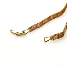 Rectangular box-style fold-over clasp paired with a triangular end loop connector