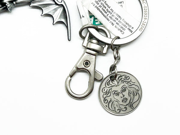 Perfect for Disney fans: our Disney Haunted Mansion Bat Key Chain provides a collectible, durable, bat wing design with iconic logo. Shop today!