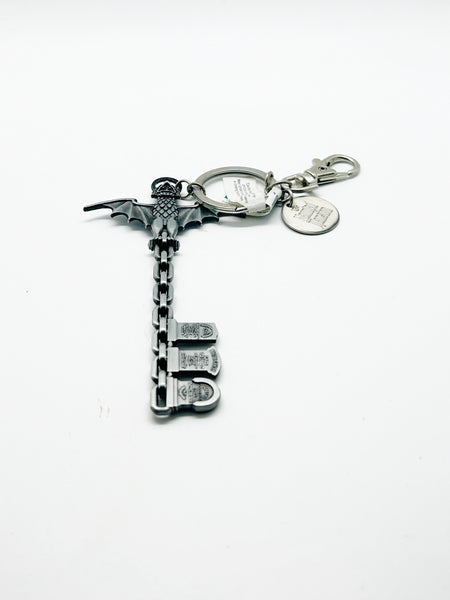 Perfect for Disney fans: our Disney Haunted Mansion Bat Key Chain provides a collectible, durable, bat wing design with iconic logo. Shop today!