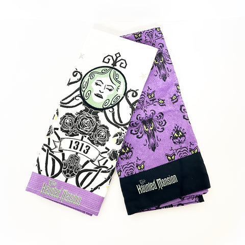 Perfect for Haunted Mansion fans: our Disney Haunted Mansion Purple Dish Towels (2023) provide spooky charm and practical use. Shop today!