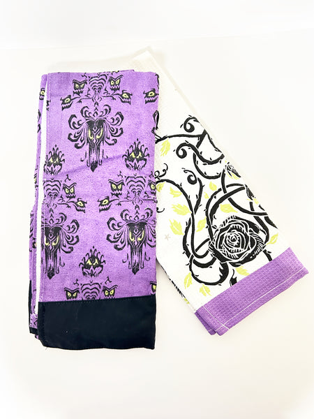 Perfect for Haunted Mansion fans: our Disney Haunted Mansion Purple Dish Towels (2023) provide spooky charm and practical use. Shop today!