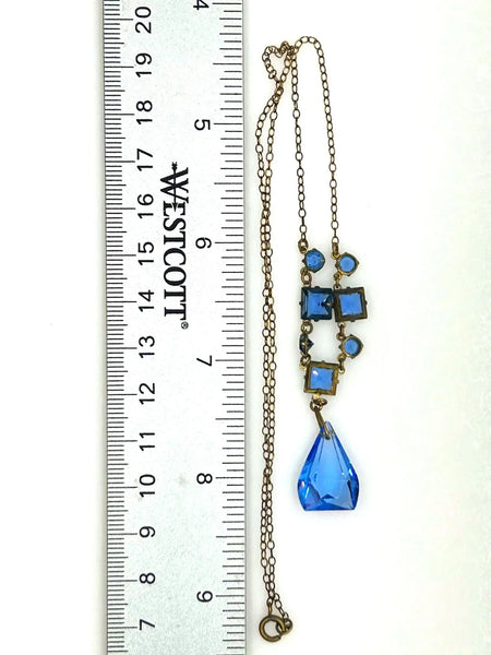 Perfect for jewelry lovers: our Vintage Art Deco Drop Blue Glass Necklace provides a beautiful blue drop design with premium heritage craftsmanship. Shop today!