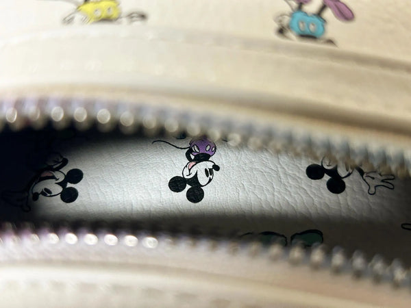  Enjoy the exclusive, pastel rainbow charm of our Loungefly Disney Pastel Rainbow Mickey Mouse Mini Backpack. Adjustable straps add comfort. Very hard to find